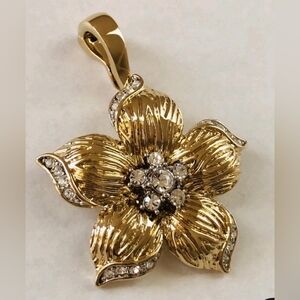 Beautiful Nolan Miller Gold Tone Flower Pendant/Enhancer With Rhinestone Center
